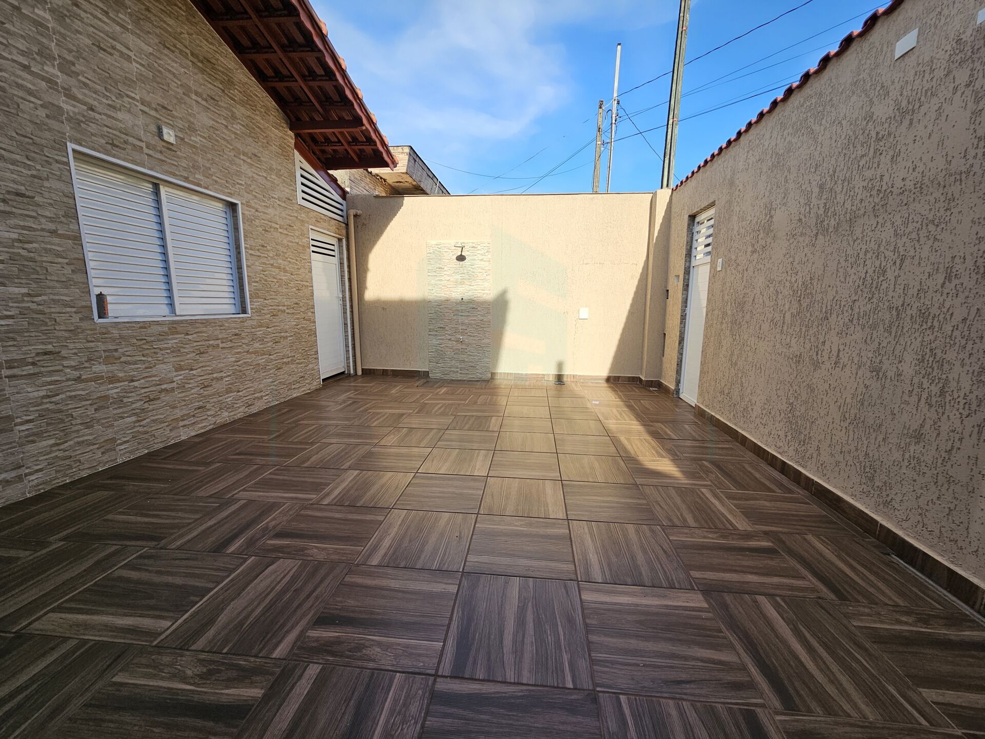 Casa com churrasqueira e piscina à venda em Praia Grande