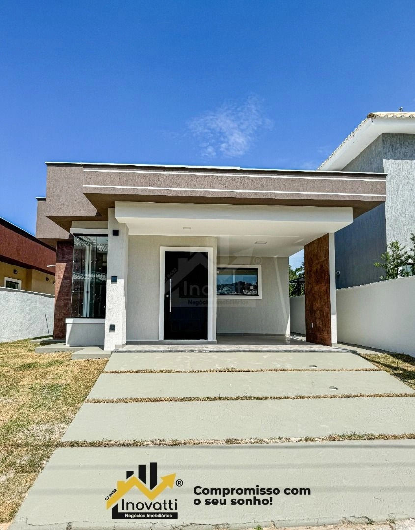 Casa com 3 dormitórios sendo uma suíte à venda, por R$ 490.000 - em Condomínio próximo ao Centro - Maricá/RJ