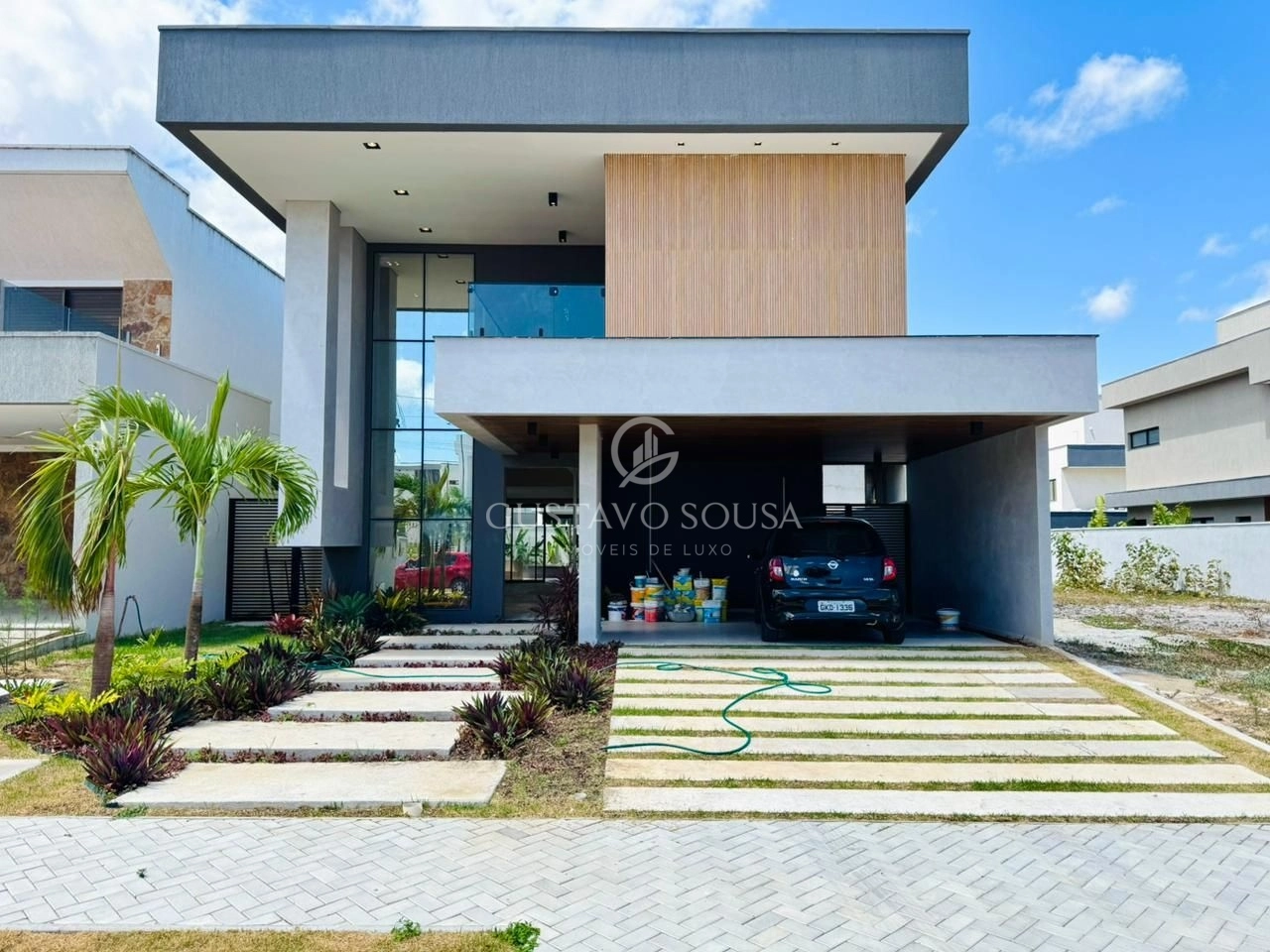 Casa com 4 dormitórios à venda, 275 m² por R$ 1.950.000,00 - Cidade Alpha - Eusébio/CE