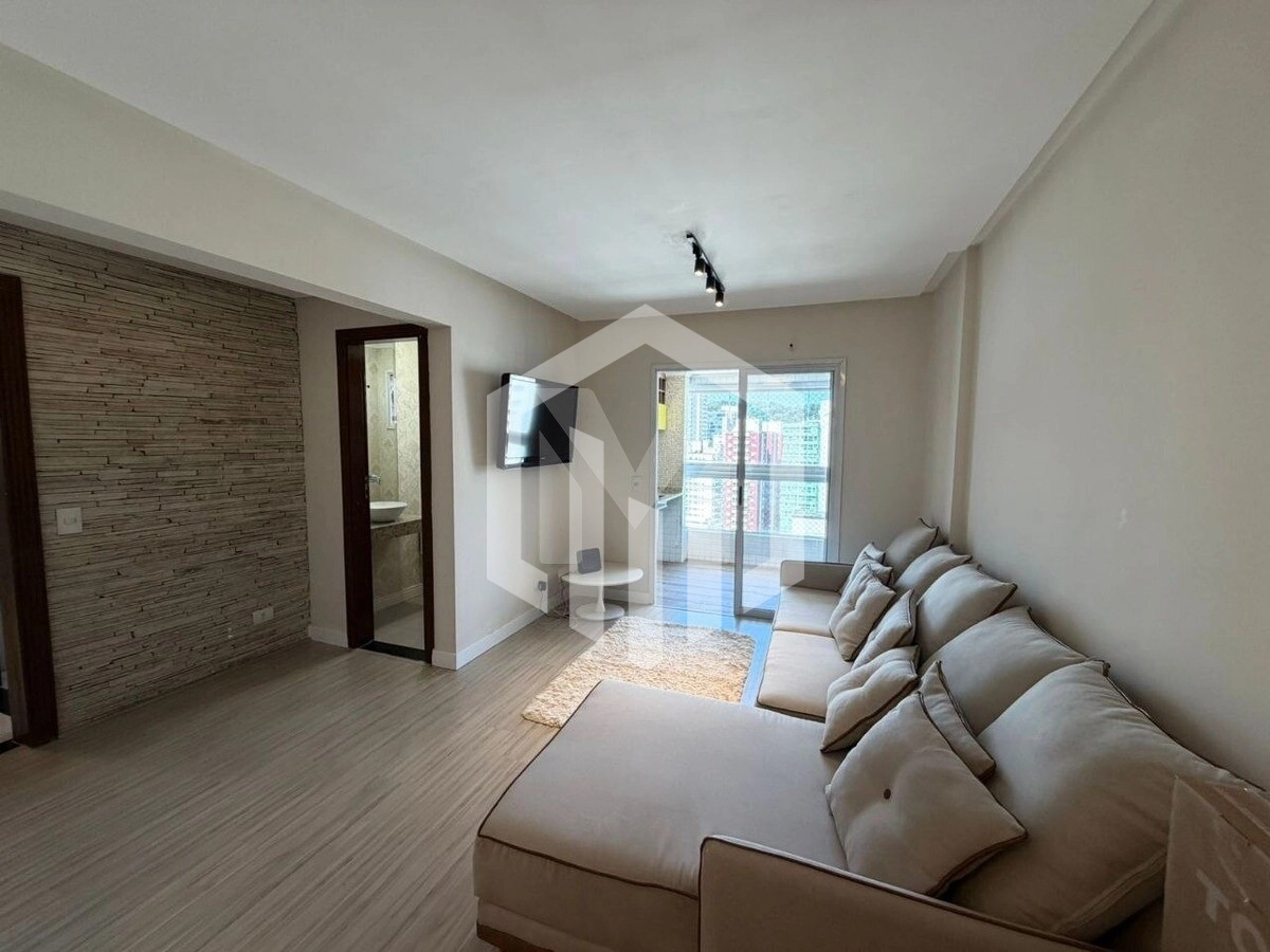 Apartamento mobiliado de 2 dormitórios com varanda gourmet e vista livre no Canto do Forte