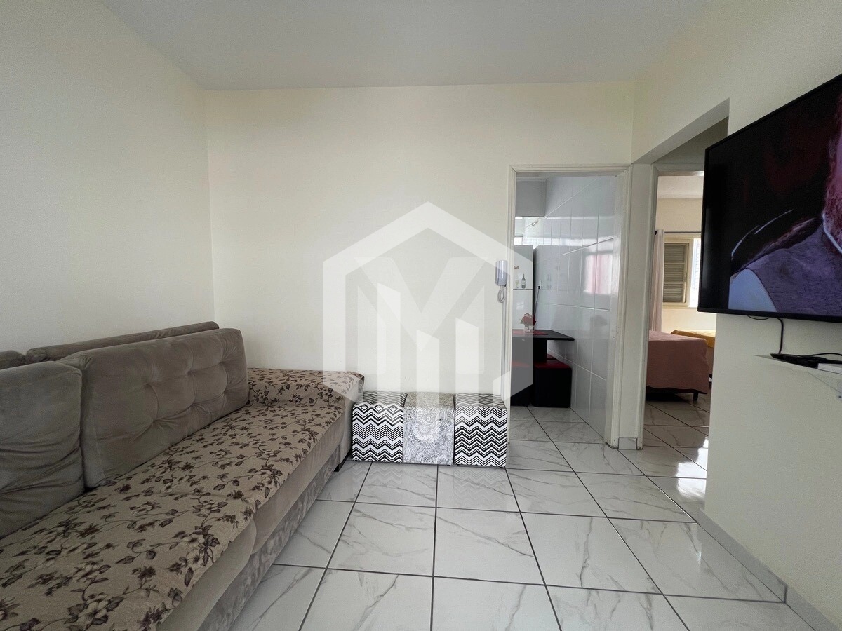 Apartamento de 1 dormitório na Guilhermina, 45m², 190m do mar, vaga e excelente para investimento