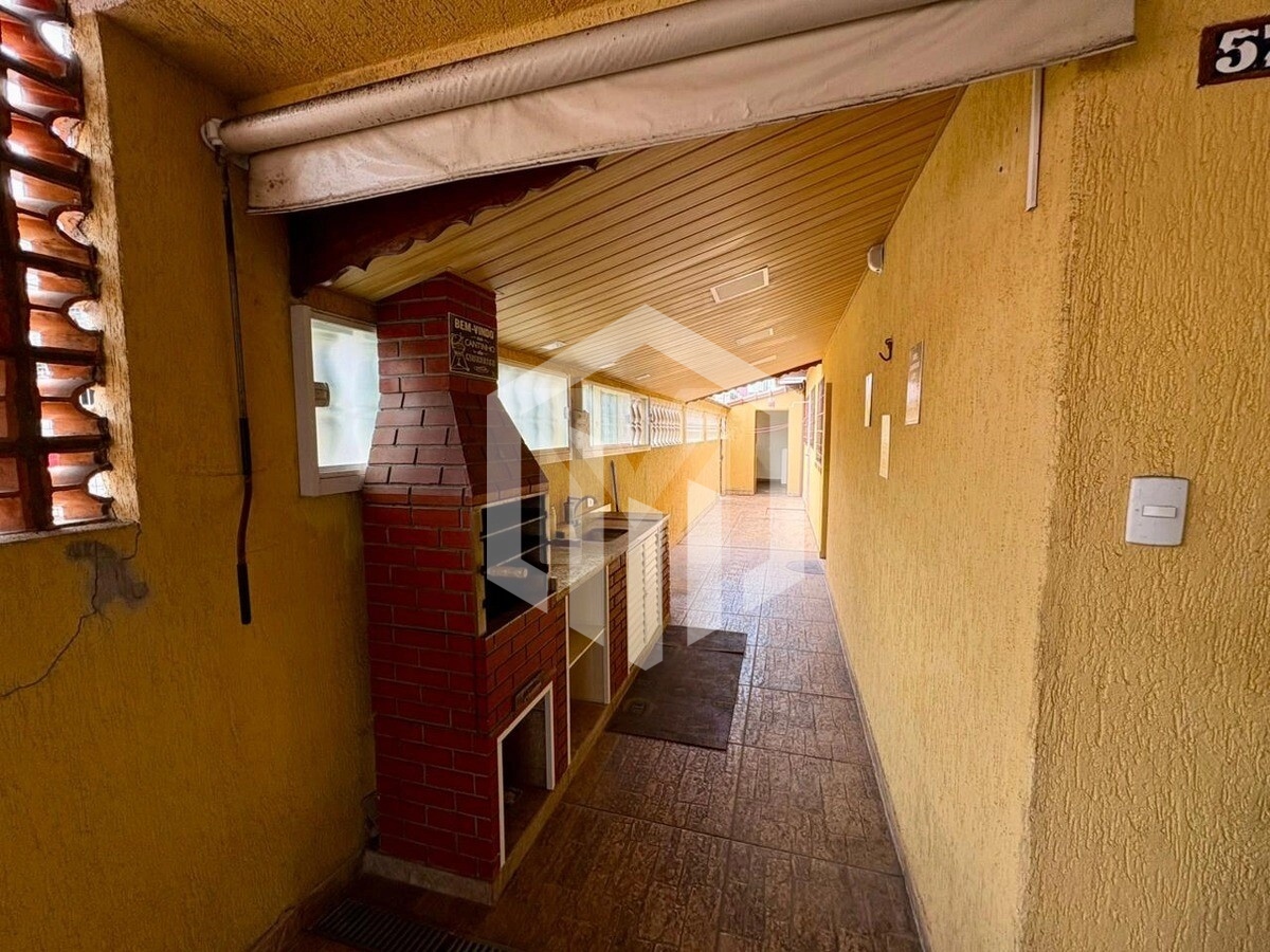 Casa térrea na Ocian, Praia Grande, com 2 dormitórios, garagem para 2 carros e área gourmet