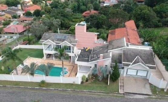 Casa com 5 dormitórios (2 suítes) à venda, 517 m² por R$ 1.600.000 | Condomínio Terras de Santa Rosa — Salto/SP